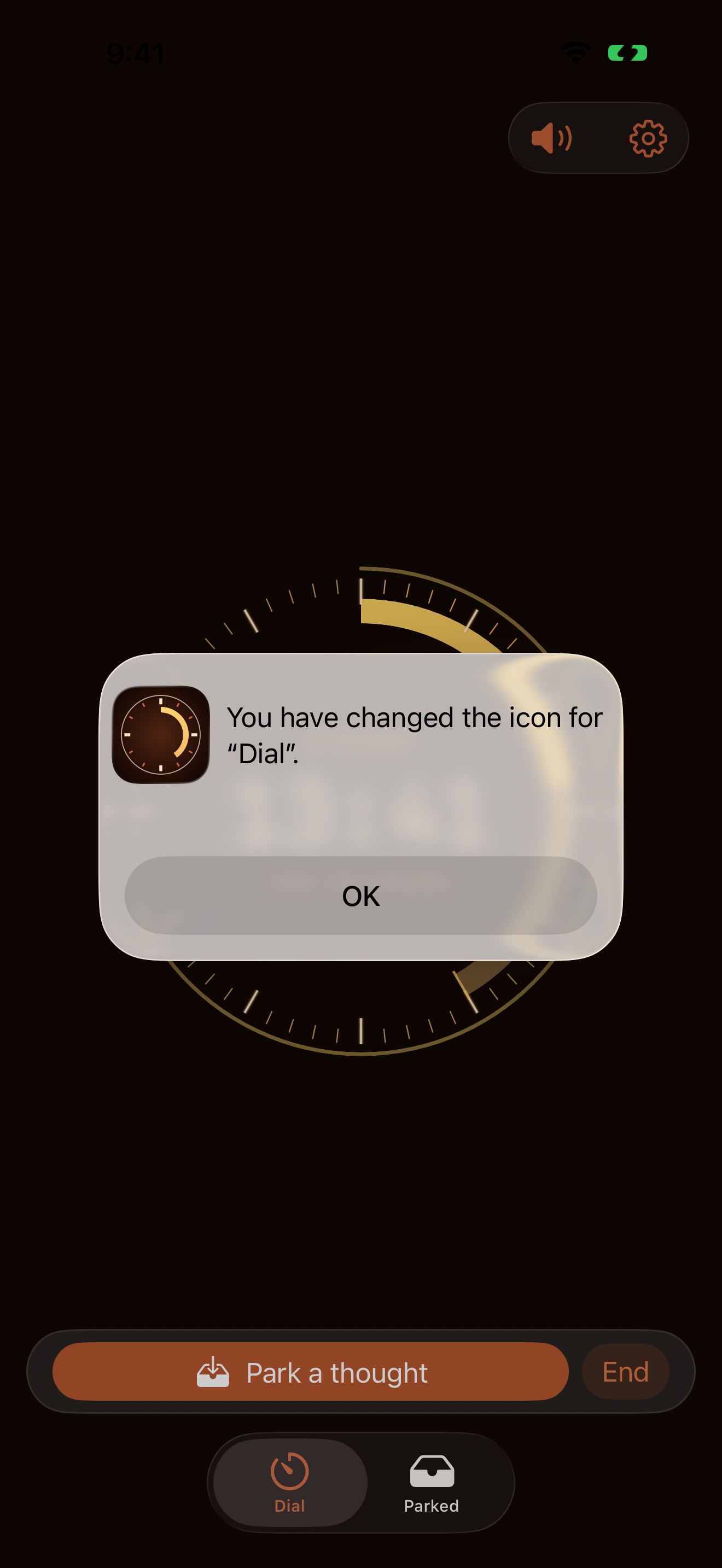 Dial at about thirteen minutes elapsed in Ember: warm gold time, coral controls, and brass dial marks.